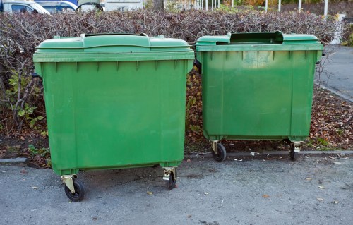 Residents arranging furniture for disposal in Brixton
