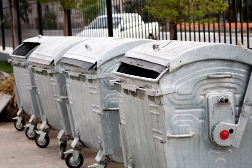 Different types of business waste segregated for removal
