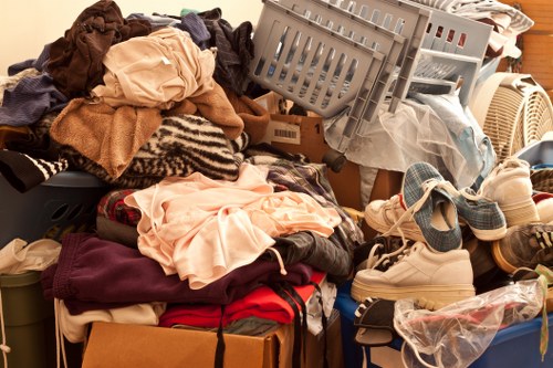 Variety of items being sorted for flat clearance in Brixton